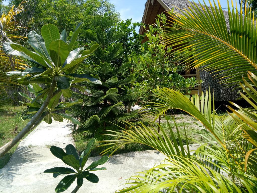 Rose Bungalow Hotel Pemenang Bagian luar foto